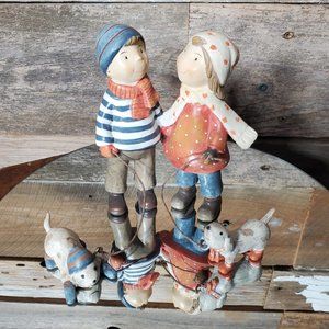 Figurine - Boy & Girl Walking dogs - Brisk Walk - Stocking Caps - Scarves